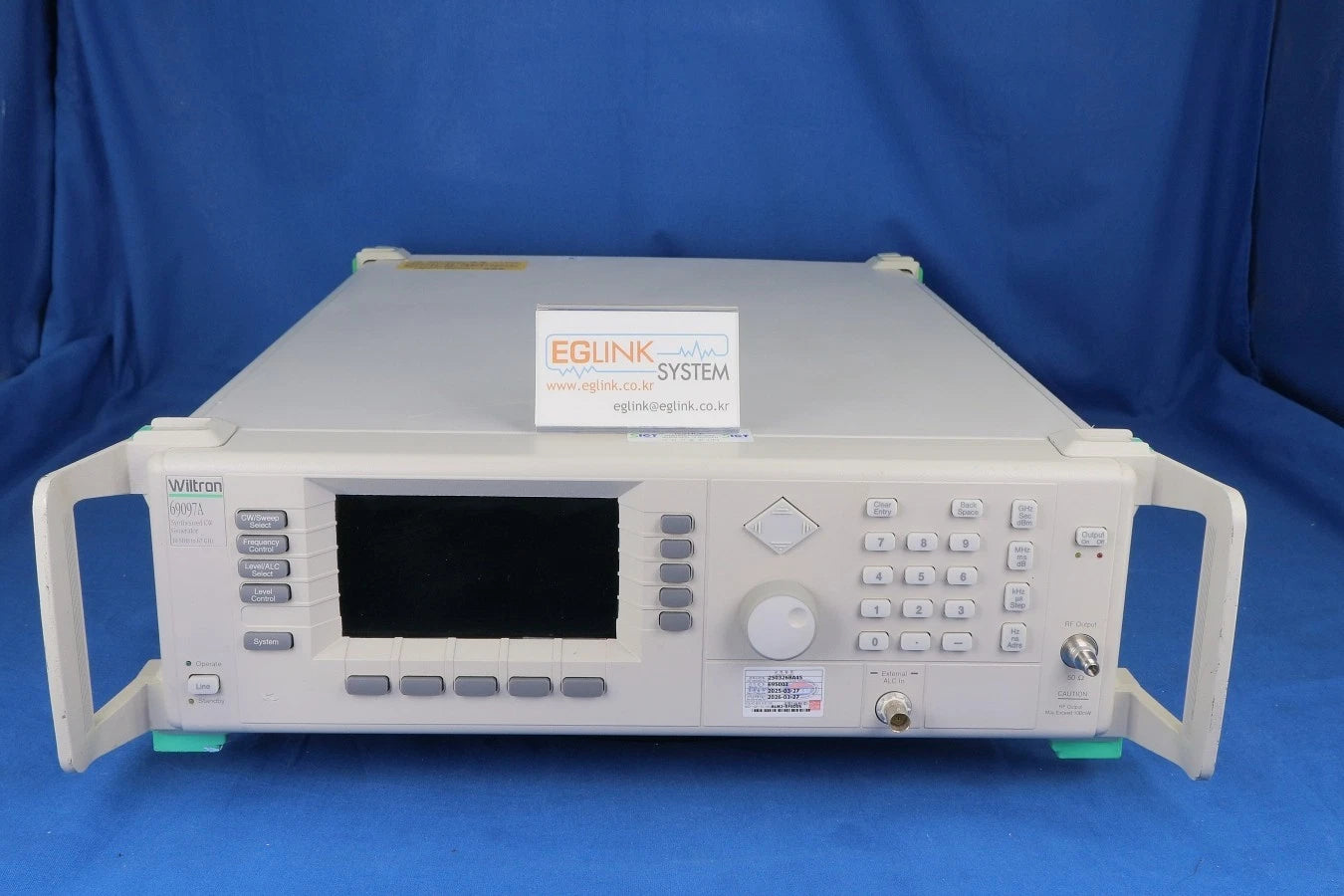 Wiltron 69097A Signal Generator 10MHz to 67GHz, opt 1/ 11/ 16